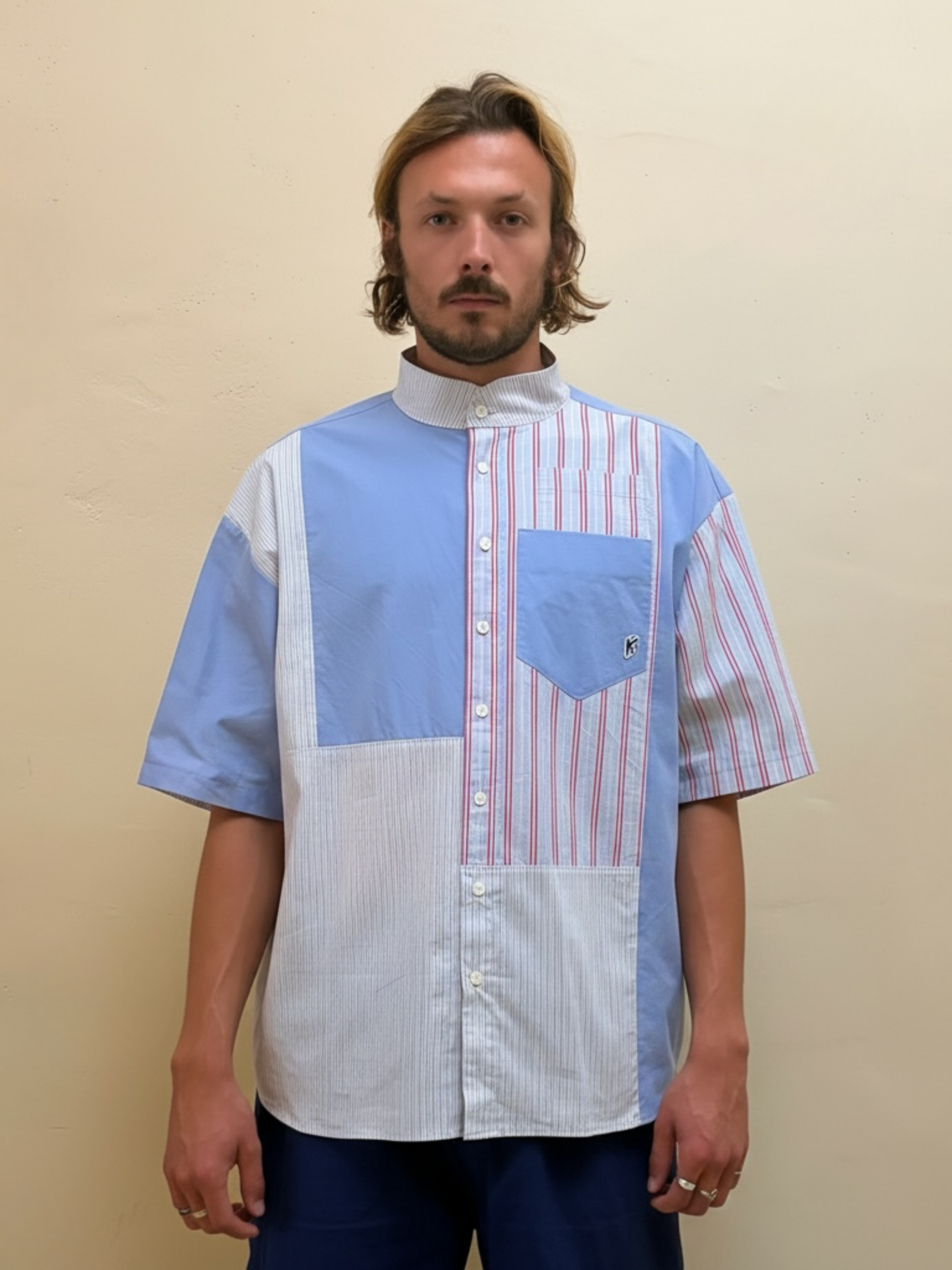 The Blue Rhythm One blue striped upcycled patchwork shirt with red accents, front view