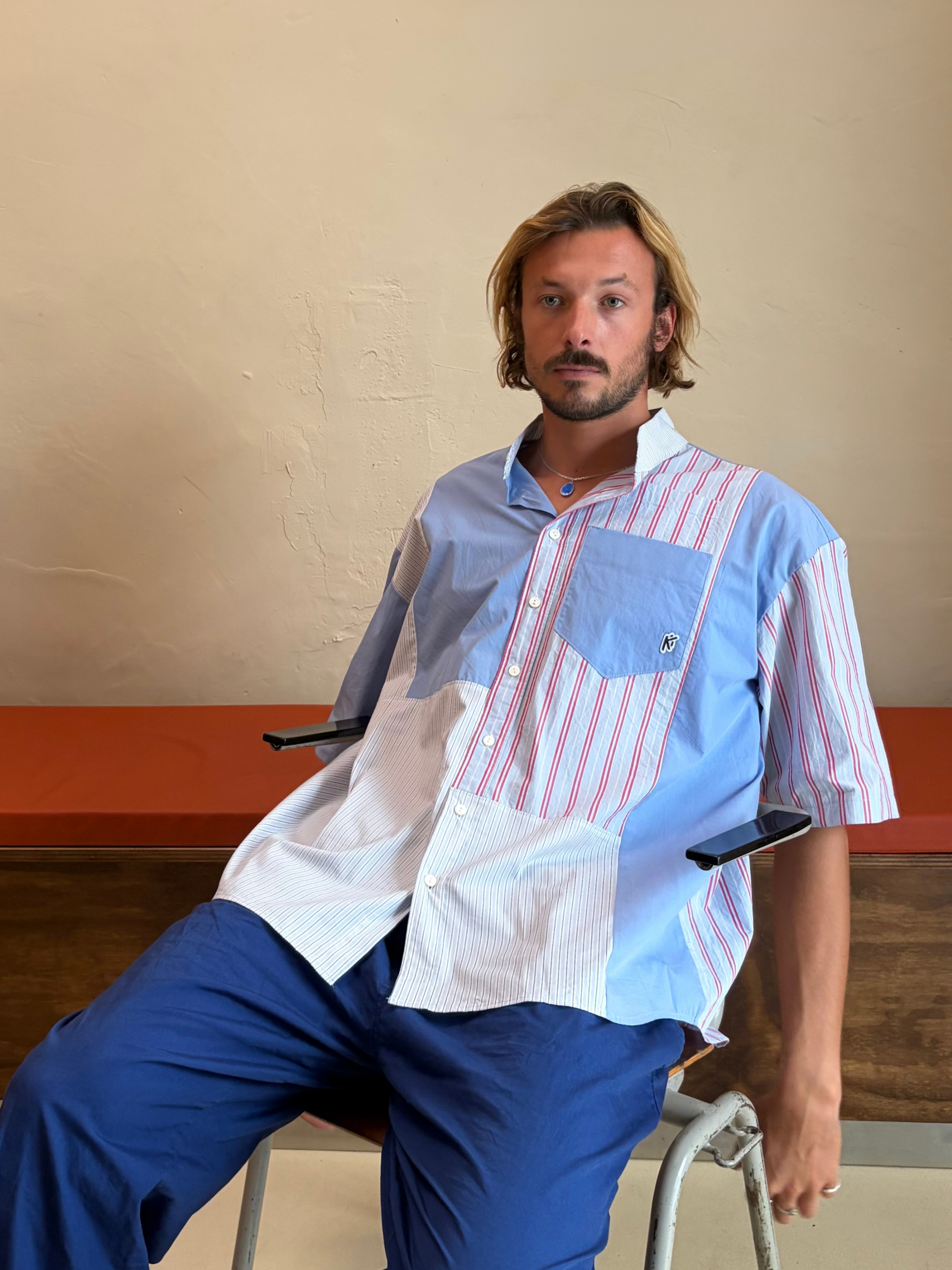 Model wearing The Blue Rhythm One blue striped upcycled patchwork shirt by Kazuki