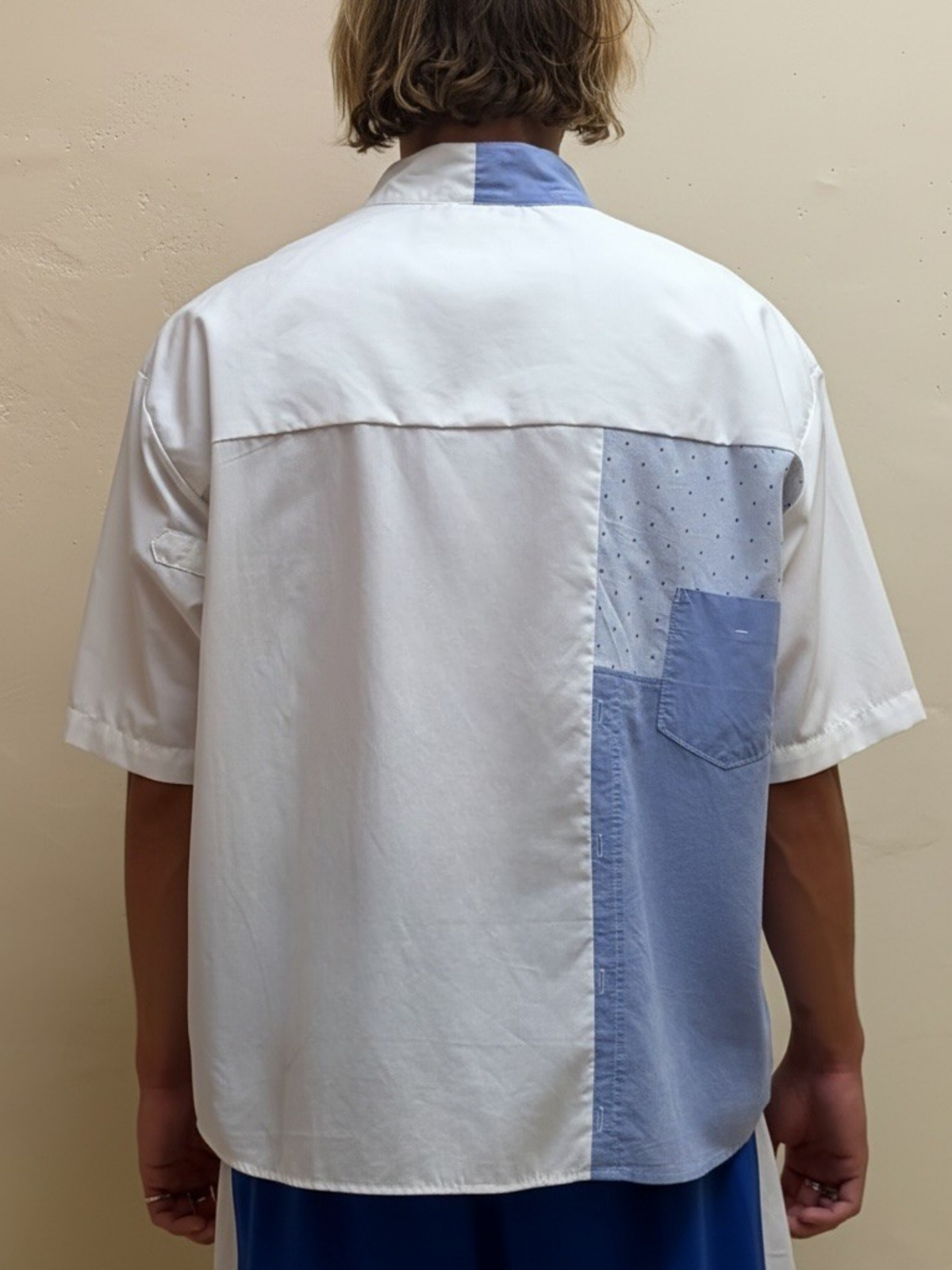 The Soft Sky One blue and white upcycled patchwork shirt with back pocket, back view