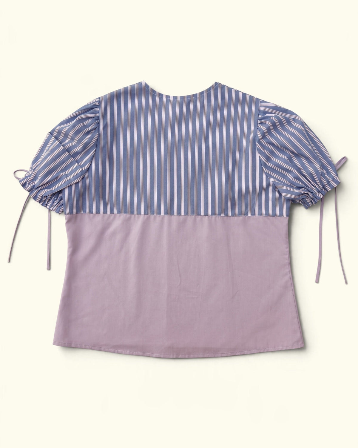 The bluestripe & Lilac One upcycled cotton puff sleeve blouse by Kazuki, back view