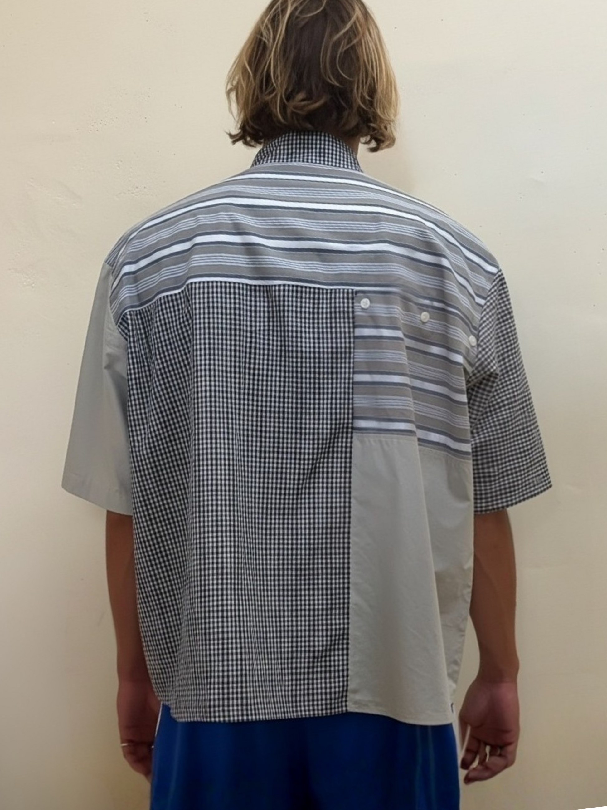 The Sunday Patchwork One checked and striped patchwork shirt by Kazuki, back view