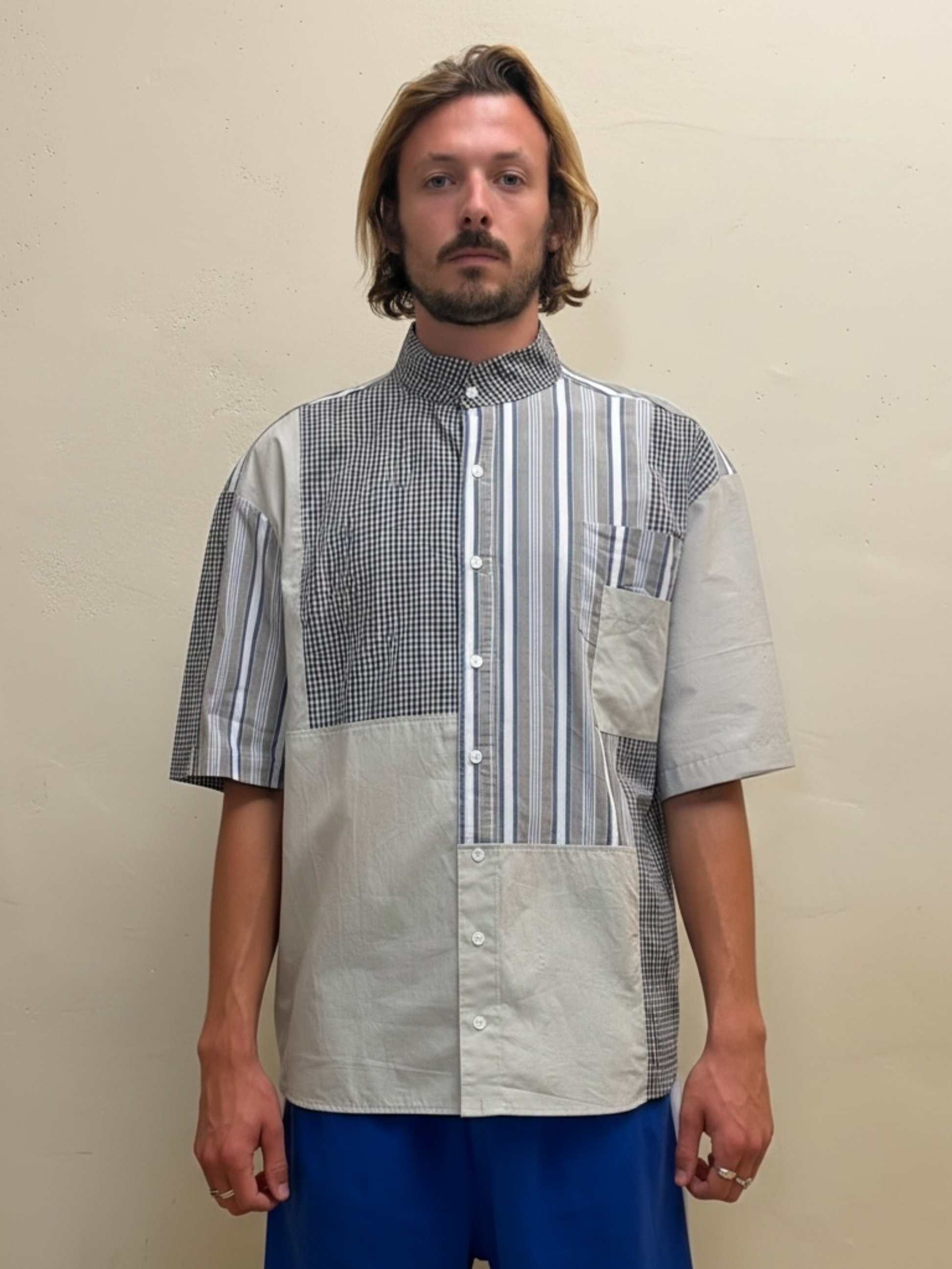 The Sunday Patchwork One checked and striped patchwork shirt by Kazuki, front view