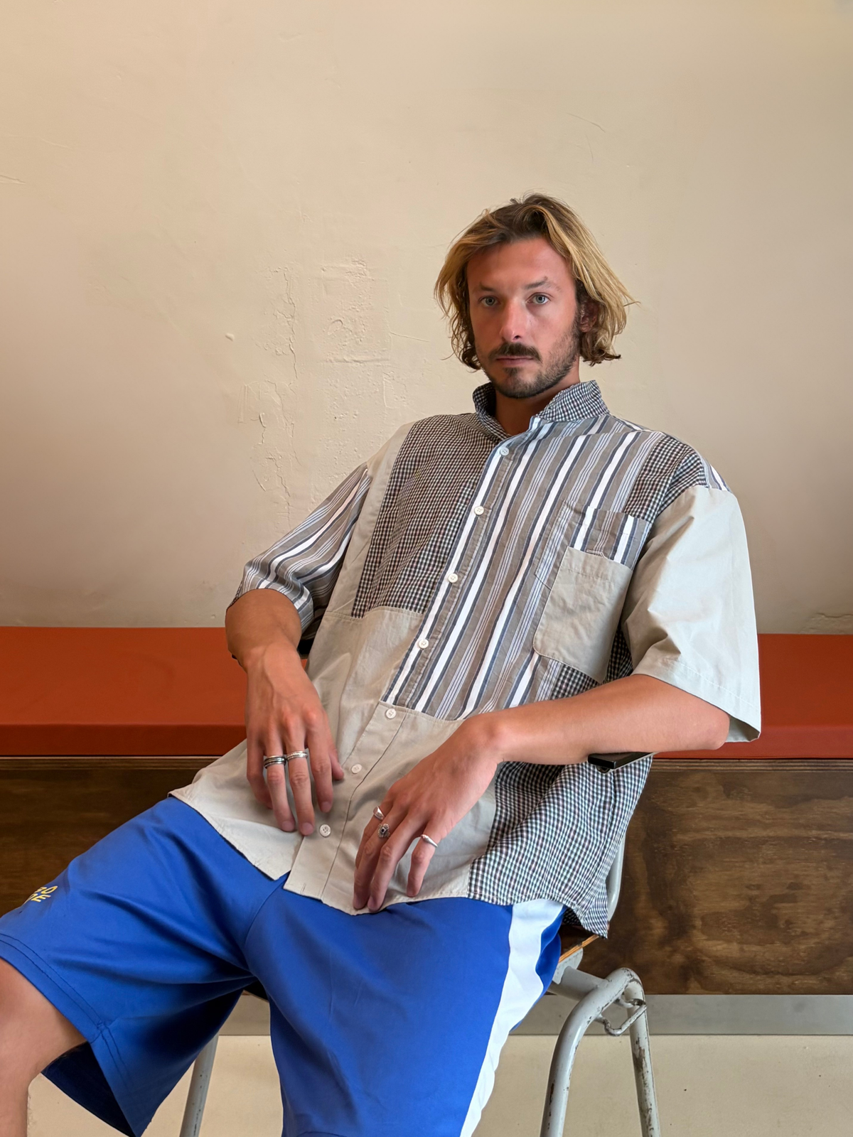 Model wearing The Sunday Patchwork One checked and striped upcycled shirt by Kazuki