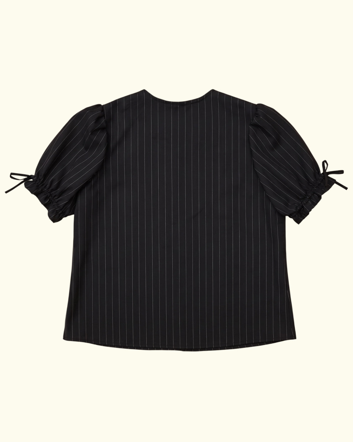 Pinstripe Dolly black wool puff sleeve blouse by Kazuki, back view