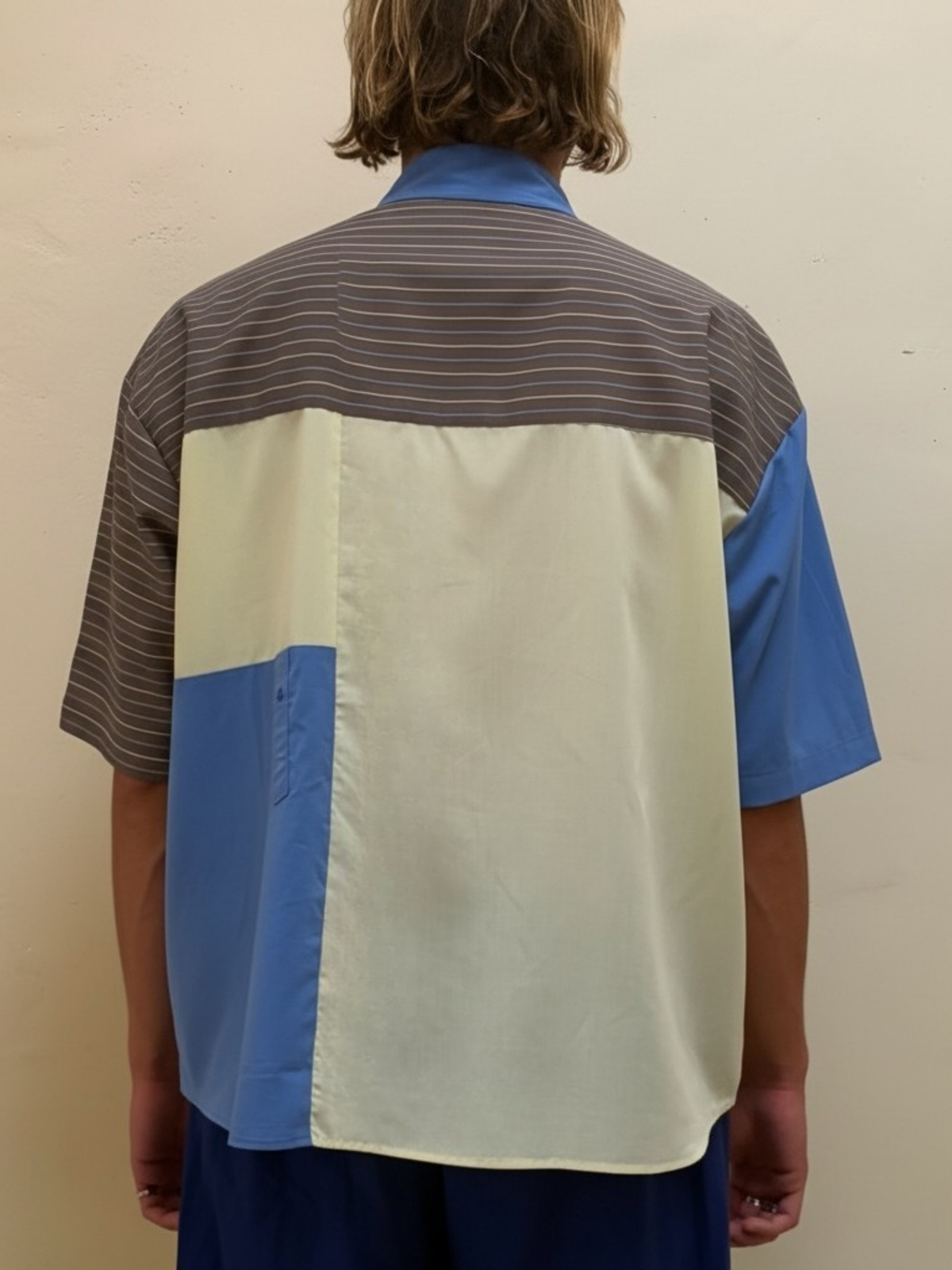 The Sand & Sky One blue and beige upcycled patchwork shirt by Kazuki, back view