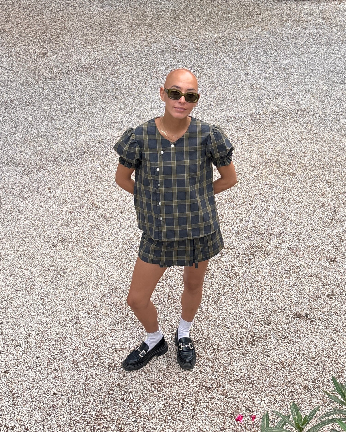 Tartan Dolly grey and olive cotton puff sleeve blouse by Kazuki, front view with asymmetric button line